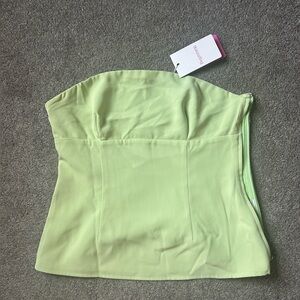 New with tags beginning boutique green strapless top size medium.